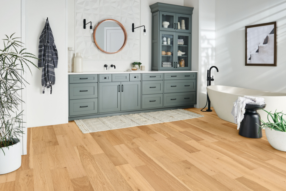 Bathroom with natural-toned hardwood